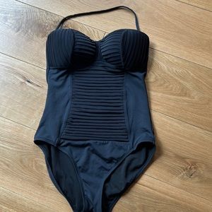 2Bamboo ladies swimsuit. Black with flattering ruching on tummy area. Worn once.